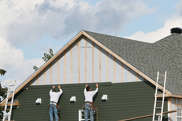 Professional Storm Damage Siding Repair technician working in Maysville, KY